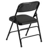 HERCULES Series Curved Triple Braced & Double Hinged Black Patterned Fabric Metal Folding Chair - Flash Furniture