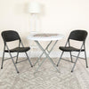 HERCULES Series 330 lb. Capacity Black Plastic Folding Chair with Charcoal Frame - Flash Furniture
