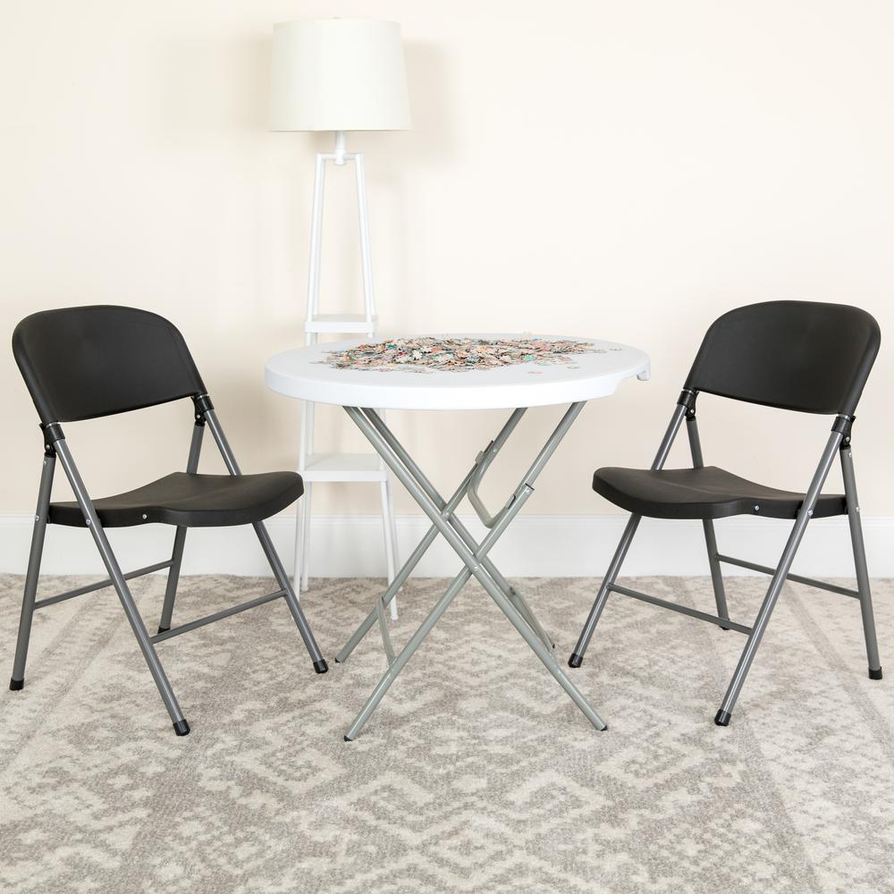 HERCULES Series 330 lb. Capacity Black Plastic Folding Chair with Charcoal Frame - Flash Furniture