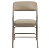 HERCULES Series Curved Triple Braced & Double Hinged Beige Vinyl Metal Folding Chair - Flash Furniture