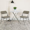 HERCULES Series Curved Triple Braced & Double Hinged Gray Vinyl Metal Folding Chair - Flash Furniture