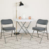HERCULES Series Premium Curved Triple Braced & Double Hinged Gray Fabric Metal Folding Chair - Flash Furniture