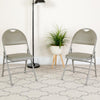 HERCULES Series Ultra-Premium Triple Braced Gray Vinyl Metal Folding Chair with Easy-Carry Handle - Flash Furniture