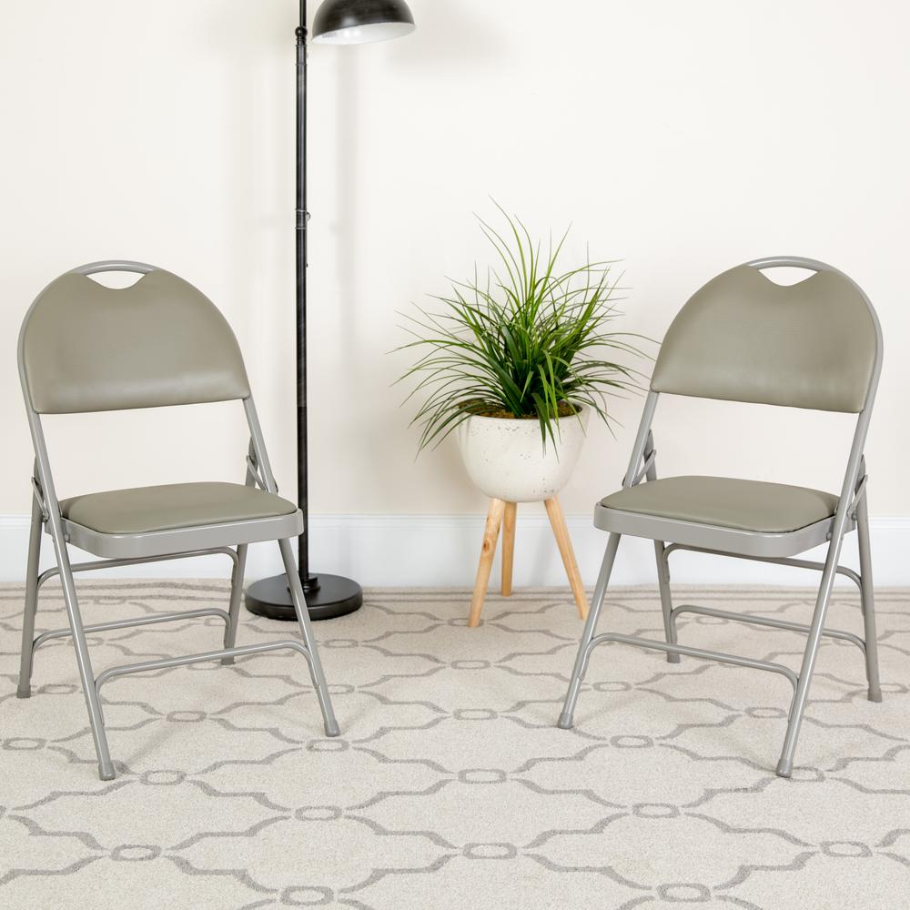 HERCULES Series Ultra-Premium Triple Braced Gray Vinyl Metal Folding Chair with Easy-Carry Handle - Flash Furniture