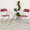 HERCULES Series 650 lb. Capacity Premium Red Plastic Folding Chair - Flash Furniture