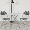 HERCULES Series 650 lb. Capacity Charcoal Plastic Fan Back Folding Chair - Flash Furniture