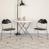 HERCULES Series Black Vinyl Metal Folding Chair with Carrying Handle - Flash Furniture
