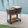 80-Quart Wood Grain Metal Rolling Ice Chest Cooler Cart with Storage Shelf - Sunjoy
