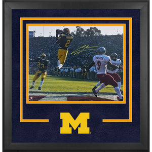 Charles Woodson Michigan Wolverines Autographed Deluxe Framed 16'' x 20'' Leaping Interception Photograph - Signature in Yellow Ink