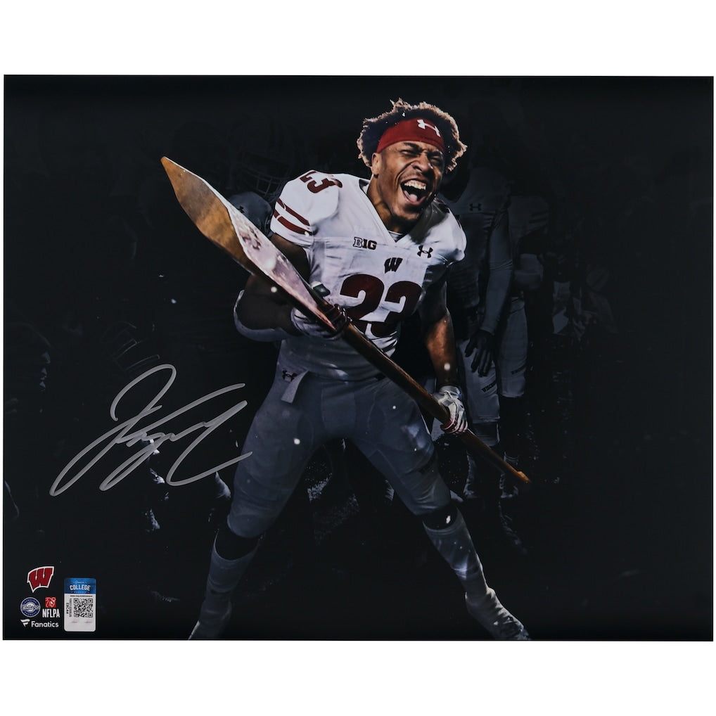Jonathan Taylor Wisconsin Badgers Autographed 16'' x 20'' Spotlight Paddle Photograph