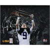 Joe Burrow LSU Tigers Autographed 8'' x 10'' Holding CFP Championship Trophy Spotlight Photograph - Signed in White Ink