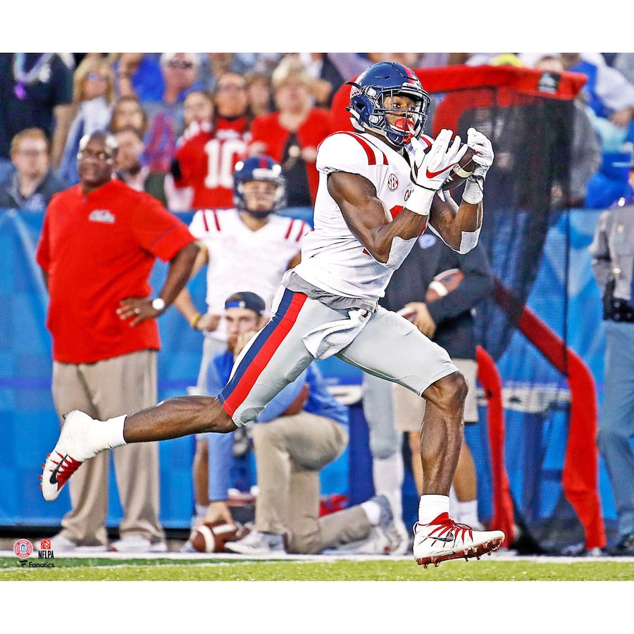 DK Metcalf Ole Miss Rebels Unsigned White Jersey Running Photograph