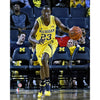 Caris LeVert Michigan Wolverines Unsigned Yellow Jersey Dribbling Photograph