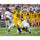 Jared Goff Cal Bears Unsigned Gold Jersey Throwing Ball Getting Tackled Photograph